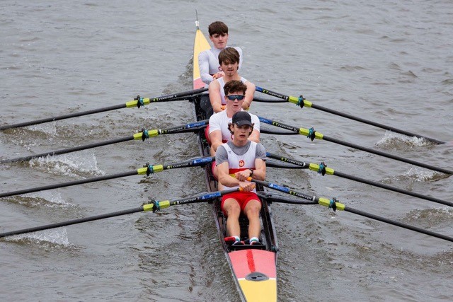 4 men rowing