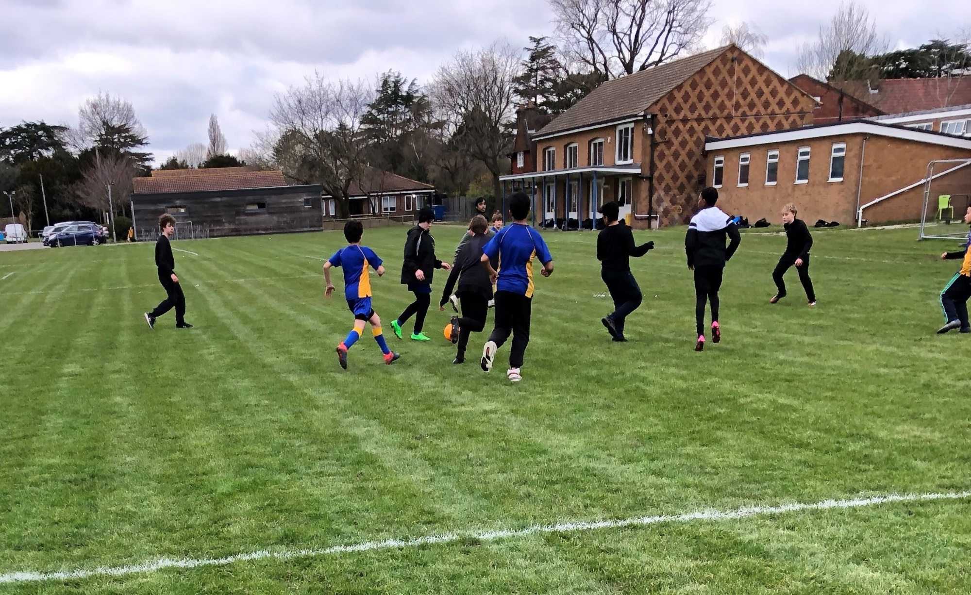 students playing football