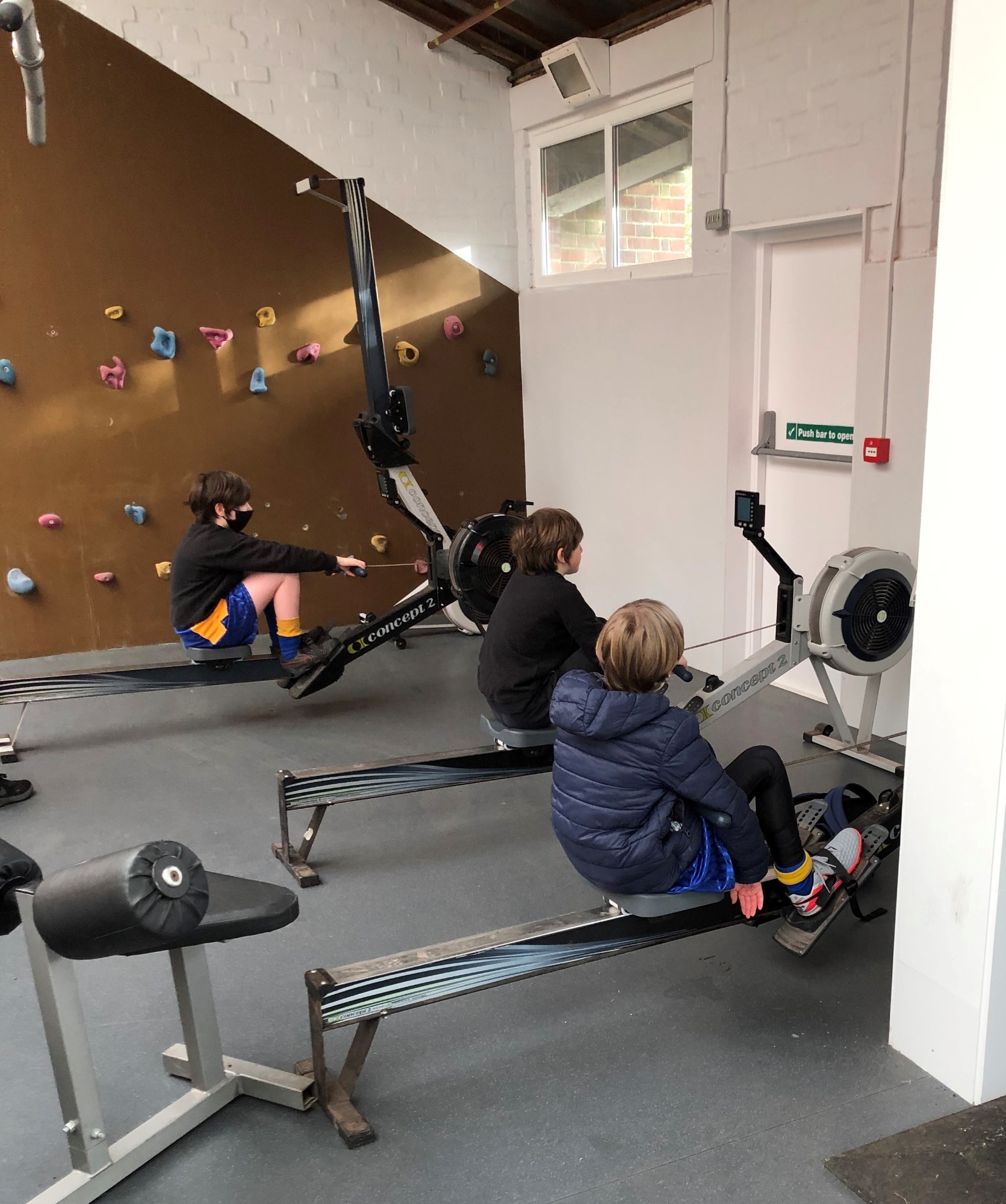 students indoor rowing