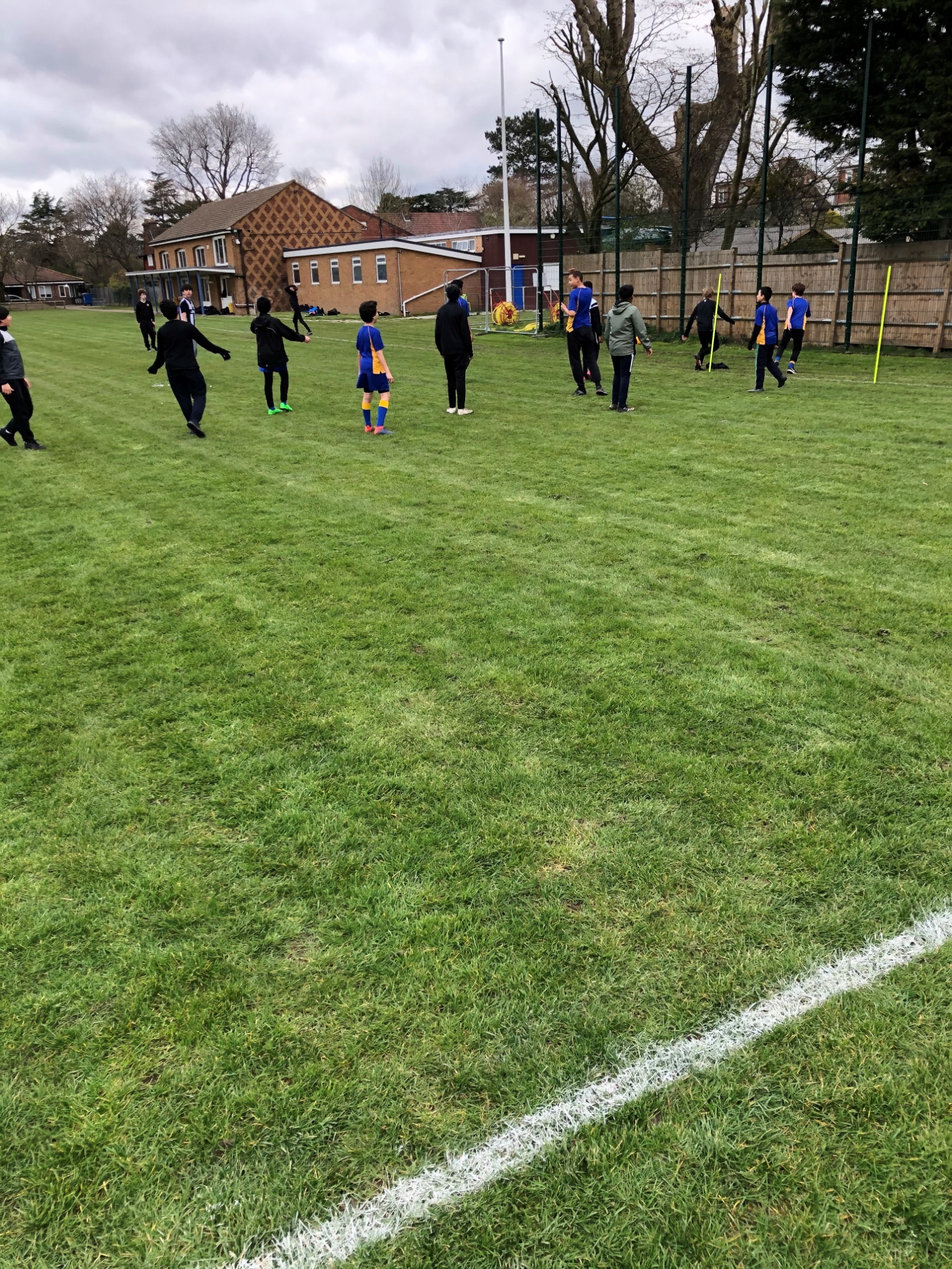 students playing football