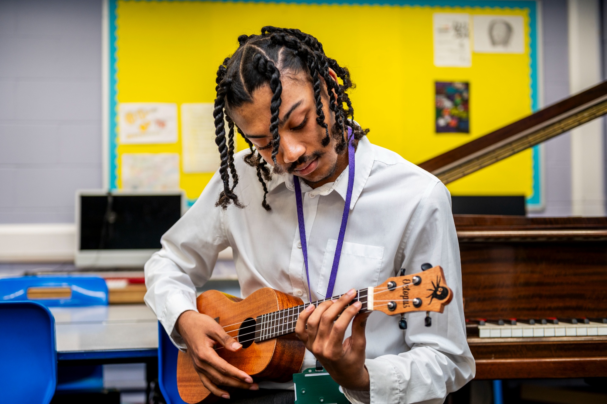 Rutlish student playing the ukelele