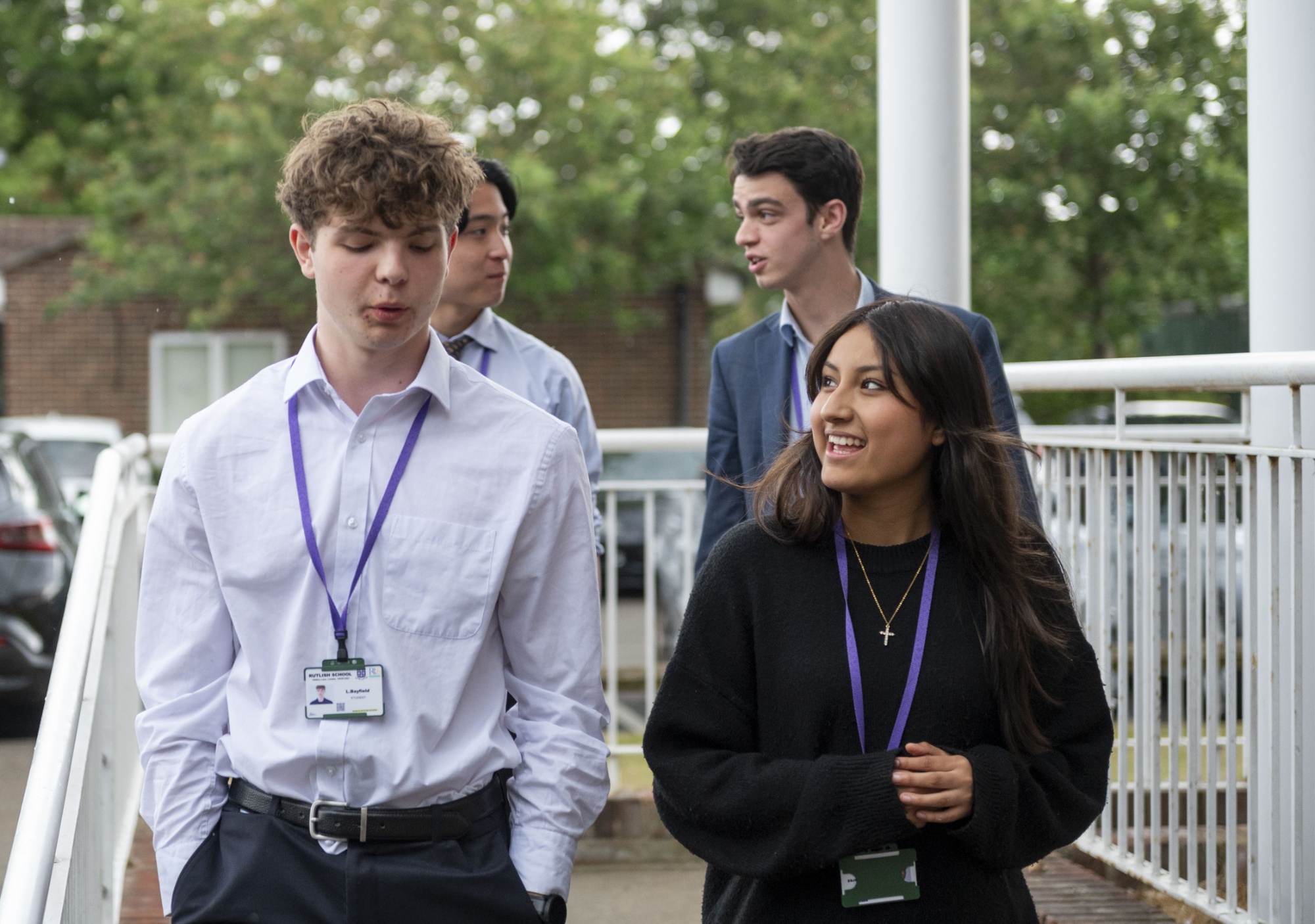 RR6 students walking by the RR6 building