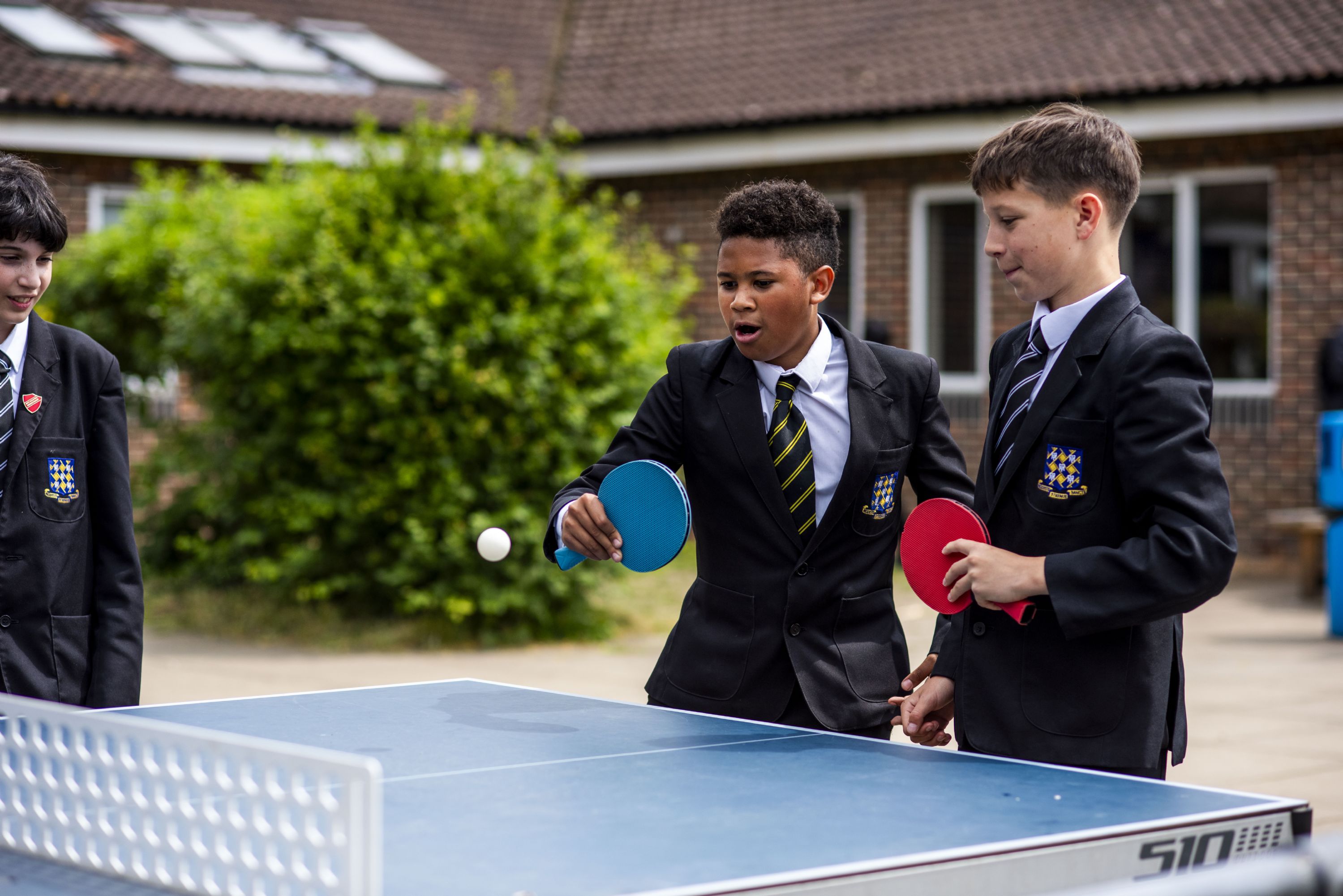 Students playing table tennis