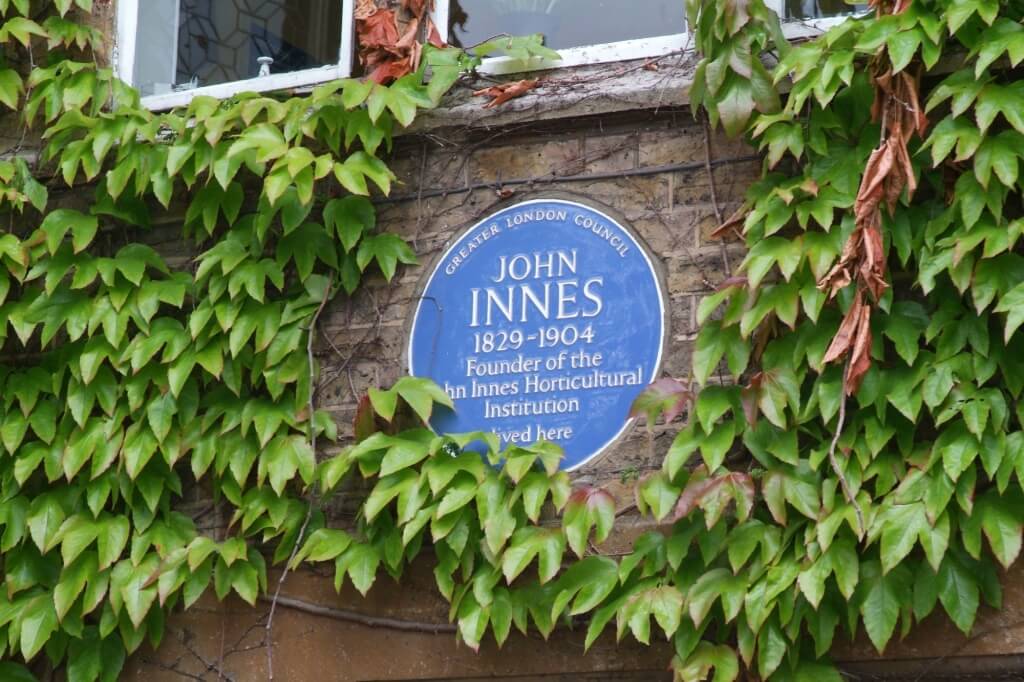 photo of the blue plaque at Rutlish School, on the Manor House commemorating John Innes living there