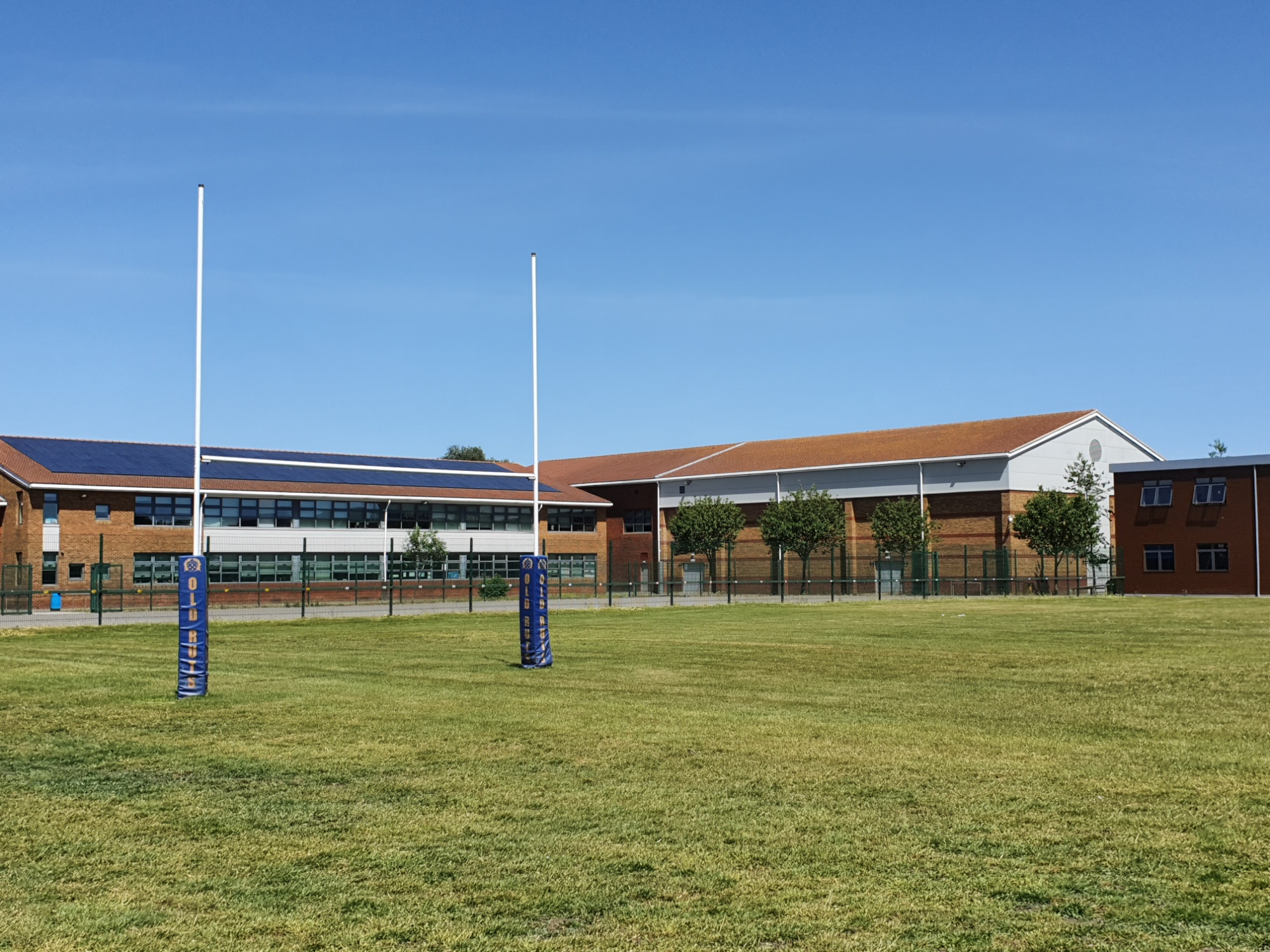 Rutlish School Sport picture of school field and rugby posts