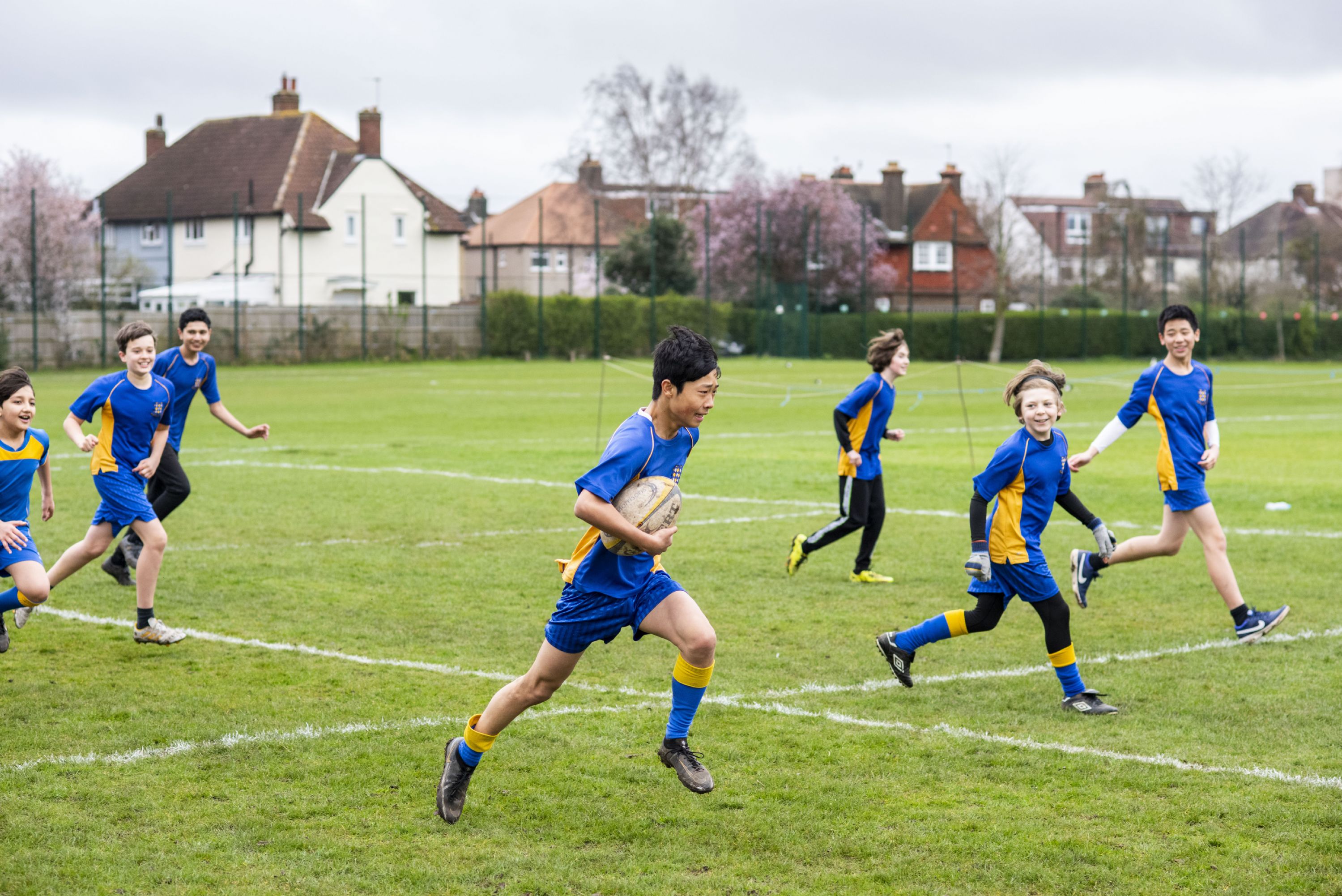 Students playing rugby