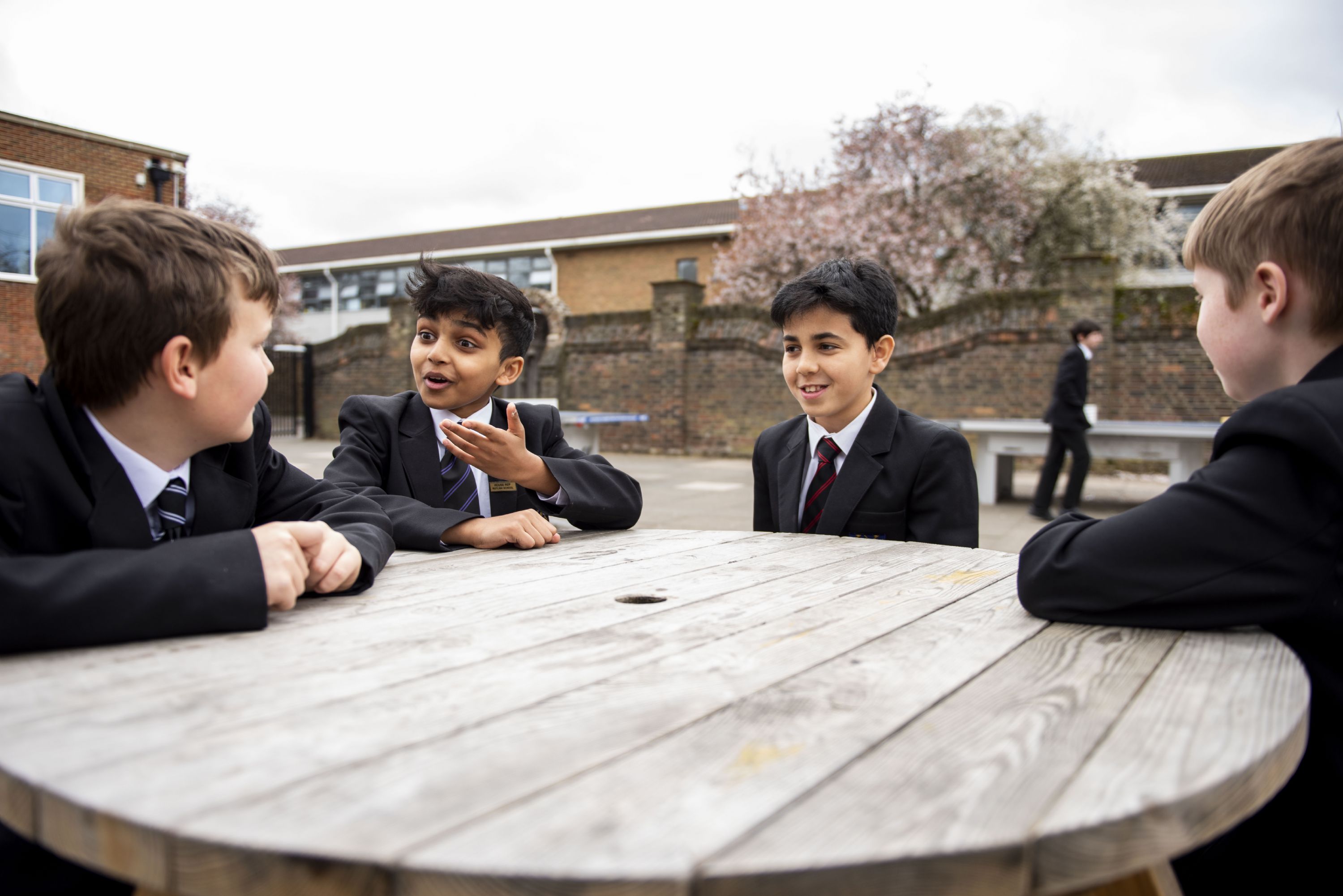 Rutlish students talking in a group